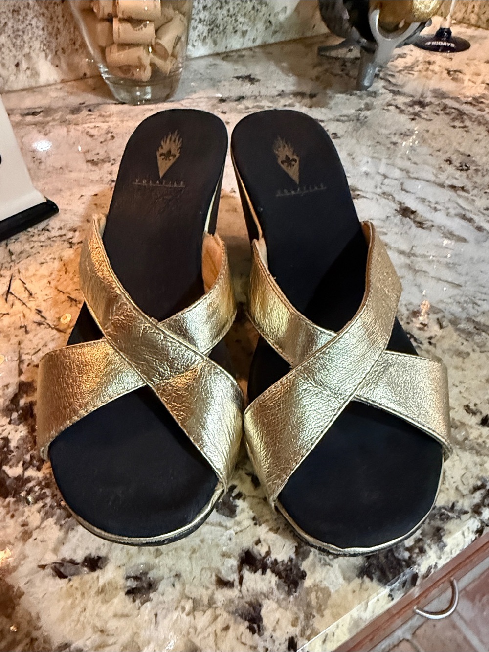 Volatile Gold Crisscross Wedge Slides with Fleur-de-Lis Accent - Picture 2 of 11